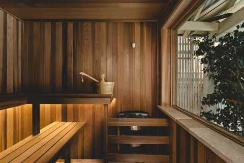 Sauna heater inside a cedar cabin