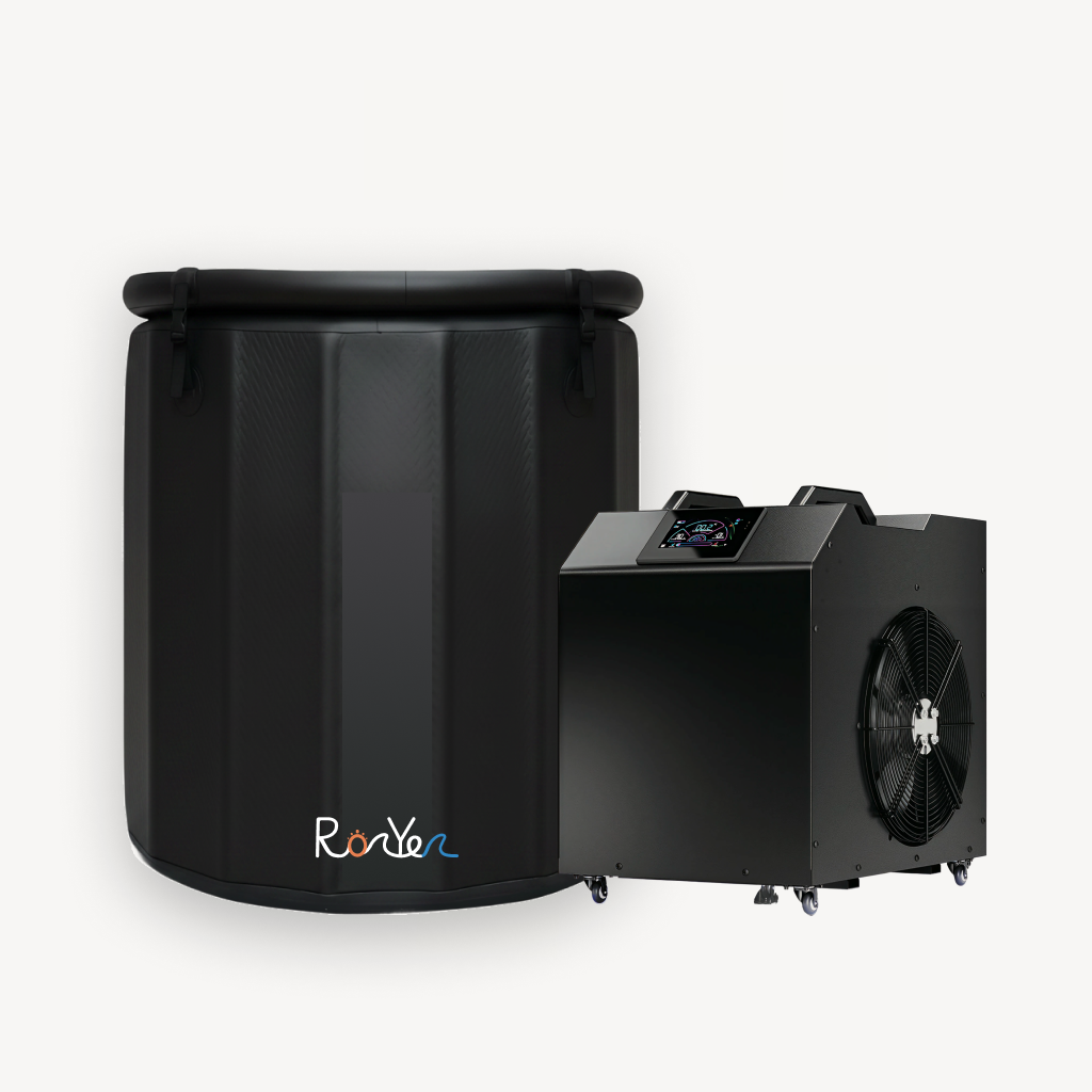 Black inflatable barrel ice bath tub with padded rim alongside a black electric chiller unit featuring a cooling fan and digital display.